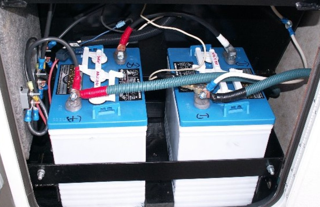 RV slide-out motor mechanism being inspected by a tech in Stuart FL