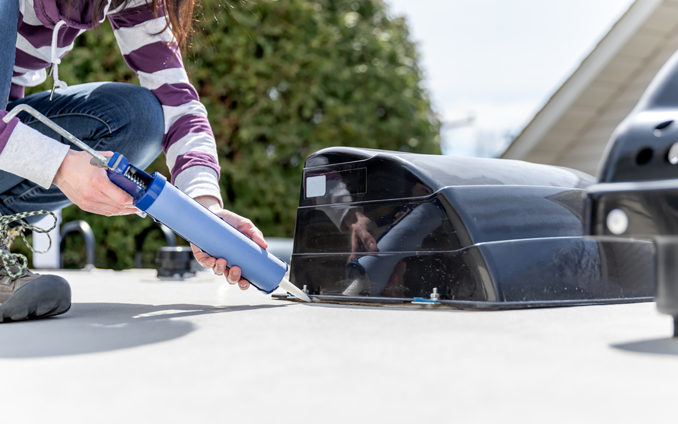 Cracked RV vent dome being replaced by a mobile technician near Stuart FL