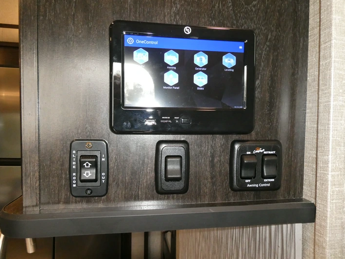 Worn slide-out seals being inspected on an RV in Stuart Florida